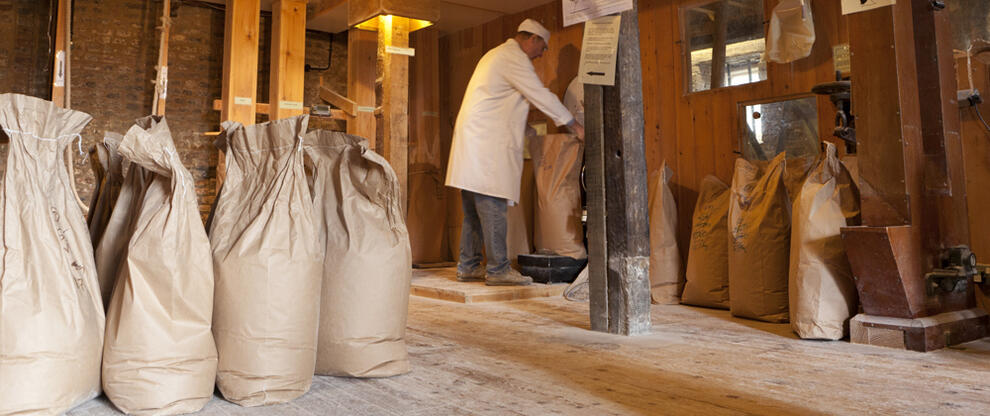 Weighing a sack of flour at Redbournbury Mill